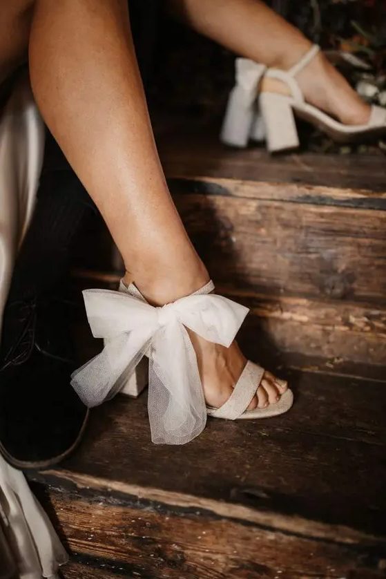 gorgeous shiny white block heels with tulle bows are an amazing addition to your chic modern bridal look