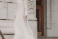 49 a turtleneck lace sheath wedding dress with long sleeves and a train for a modern and modest bride