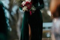 a green velvet A-line dress with a deep neckline, long sleeves, a front slit is a gorgeous solution for a modern fall bride