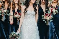 beautiful and chic navy velvet maxi bridesmaid dresses with A-line skirts and deep necklines look very elegant