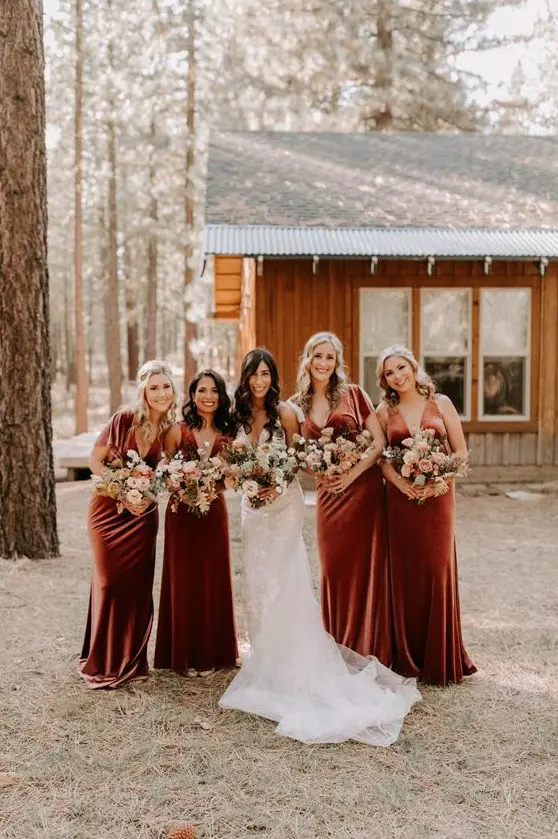 beautiful and refined burnt orange velvet maxi bridesmaid dresses with trains are adorable for a summer or fall boho wedding