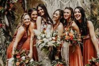 bright rust-colored mismatching mermaid maxi bridesmaid dresses are fantastic for a fall boho wedding