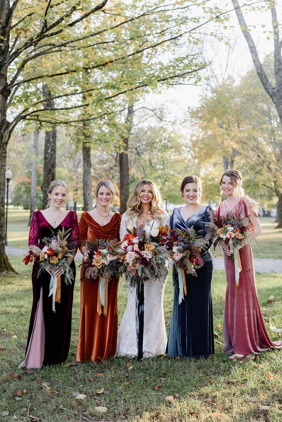 colorful velvet maxi bridesmaid dresses are a great idea for a fall wedding with plenty of color