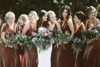 luxurious rust velvet maxi bridesmaid dresses with mismatching designs are very chic for a fall boho wedding