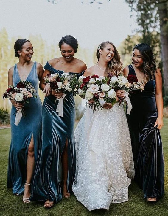 mismatching blue and navy velvet maxi bridesmaid dresses are a very cool and chic solution for a fall or winter wedding