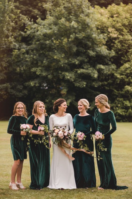 mismatching dark green velvet bridesmaid dresses are a perfect solution for a fall or Christmas wedding