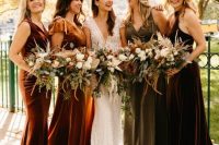 mismatching fall-toned maxi velvet bridesmaid dresses are perfection for a bold fall wedding
