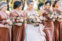 rust-colored velvet maxi bridesmaid dresses are great for a fall wedding, they look chic and catchy