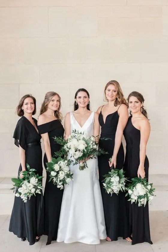 beautiful plain black maxi bridesmaid dresses with mismatching necklines and black shoes for an exquisite and chic wedding