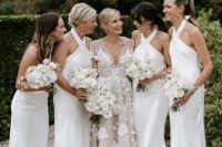 12 beautiful and elegant white midi criss cross neckline bridesmaid dresses, pearl earrings and nude shoes