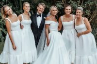 13 pretty white midi A-line bridesmaid dresses with square necklines and straps and lace up shoes