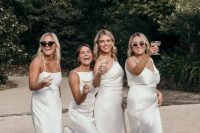 16 chic mismatching white satin maxi bridesmaid dresses with various necklines are amazing for a modern wedding with a chic feel