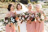 34 matching light pink midi wrap bridesmaid dresses with drapery and comfy sandals for a tropical wedding