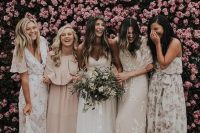 53 bridesmaids in mismatched floral maxi dresses and in blush ones for a tender and subtle combo