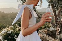 63 a white mini bridesmaid dress with a bow on the shoulder is a cool and catchy idea for a modern wedding