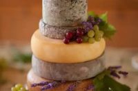 a stylish cheese tower wedding cake alternative