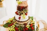 a stylish cheese wheel wedding cake
