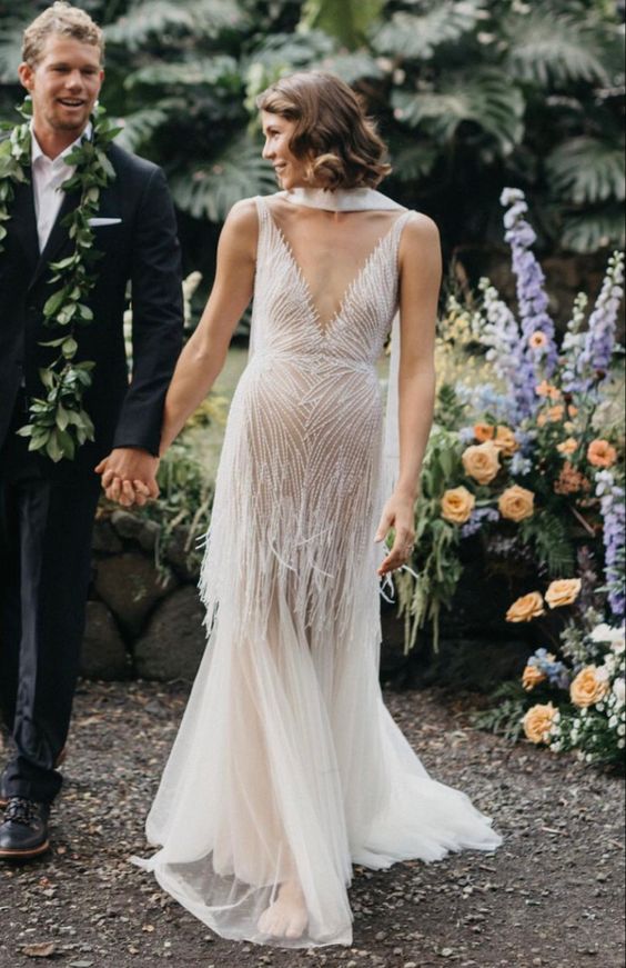 a gorgeous embellished wedding dress with fringe and a scarf for a statement and ultimate bridal look