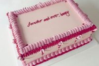 a pink and red sheet wedding cake with icing is a cool and kitschy wedding dessert for a trendy wedding