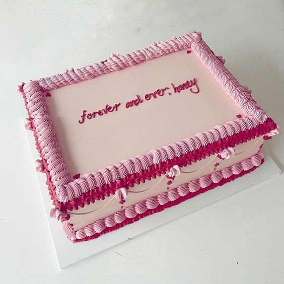 a pink and red sheet wedding cake with icing is a cool and kitschy wedding dessert for a trendy wedding