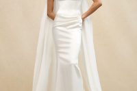 a sophisticated modern bridal look with a strapless mermaid wedding dress, a scarf is a cool and chic solution