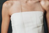 a strapless wedding dress paired with a sheer tan scarf as a delicate accent are a lovely combo