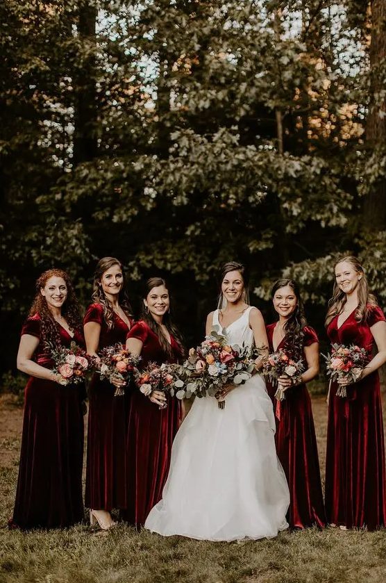 beautiful deep red velvet A-line maxi bridesmaid dresses with V-necklines and short sleeves are super cool