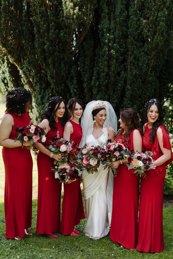 beautiful mismatching deep red maxi bridesmaid dresses will be a great idea for a bold fall wedding
