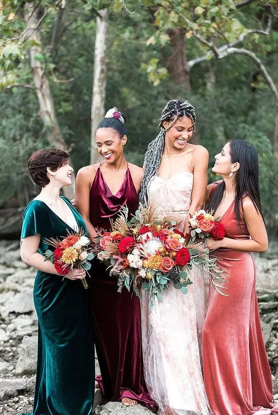 beautiful mismatching emerald, purple and coral velvet maxi bridesmaid dresses are ultimate for a bright fall wedding