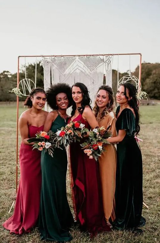 beautiful mismatching jewel tone maxi bridesmaid dresses - red, pink, dark green and marigold ones are amazing