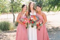 beautiful strapless and one shoulder pink maxi bridesmaid dresses with pleated skirts are amazing for summer weddings