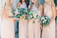 blush maxi pleated bridesmaid gowns with gold leaf detailing and halter necklines