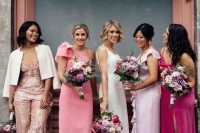 bridesmaids wearing mismatching pink, pale pink and blush maxi, midi dresses and jumpsuits with various detailing