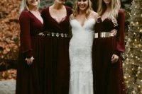 burgundy maxi dresses with long sleeves and different metallic belts for a fairy-tale inspired wedding