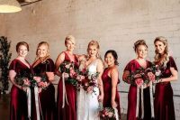 deep red velvet maxi bridesmaid dresses are a nice idea for fall or winter weddings
