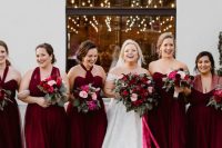 gorgeous mismatching burgundy maxi bridesmaid dresses are a great idea for a color-infused fall or winter wedding