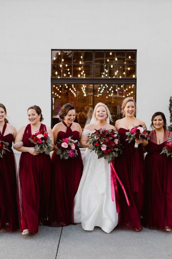 gorgeous mismatching burgundy maxi bridesmaid dresses are a great idea for a color-infused fall or winter wedding
