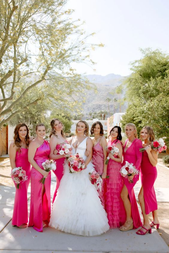 gorgeous mix and match hot pink maxi bridesmaid dresses are a cool idea for a colorful summer wedding