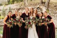 lovely mismatching burgundy velvet maxi bridesmaid dresses are a perfect solution for a fall wedding