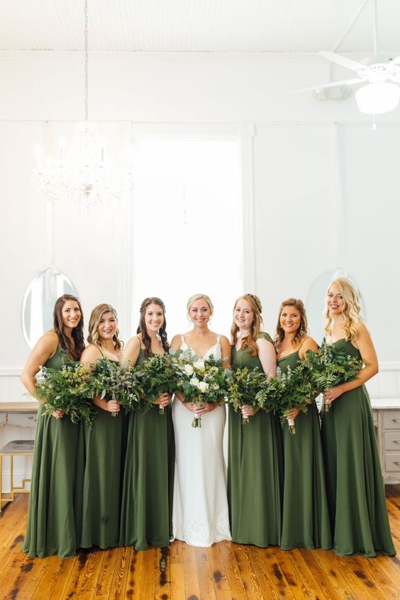 matching maxi green bridesmaid dresses with pleated skirts for a cool idea for an organic wedding