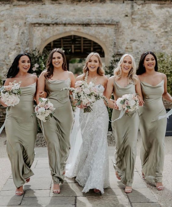 matching olive green slip maxi bridesmaid dresses with cowl necklines are great for spring and summer weddings