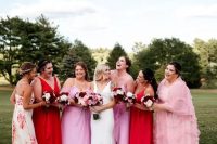 mismatched pink and red maxi bridesmaid dresses with various detailing to express the style of each gal
