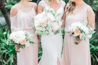 mismatching blush maxi bridesmaid dresses with slits and various necklines are a romantic and soft idea