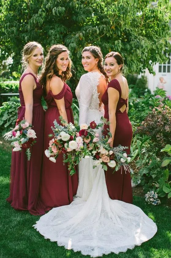 mismatching burgundy bridesmaids' dresses are a timeless solution for every bridal party