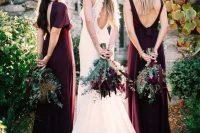 mismatching burgundy maxi dresses with cutout backs are a refined solution for a fall wedding