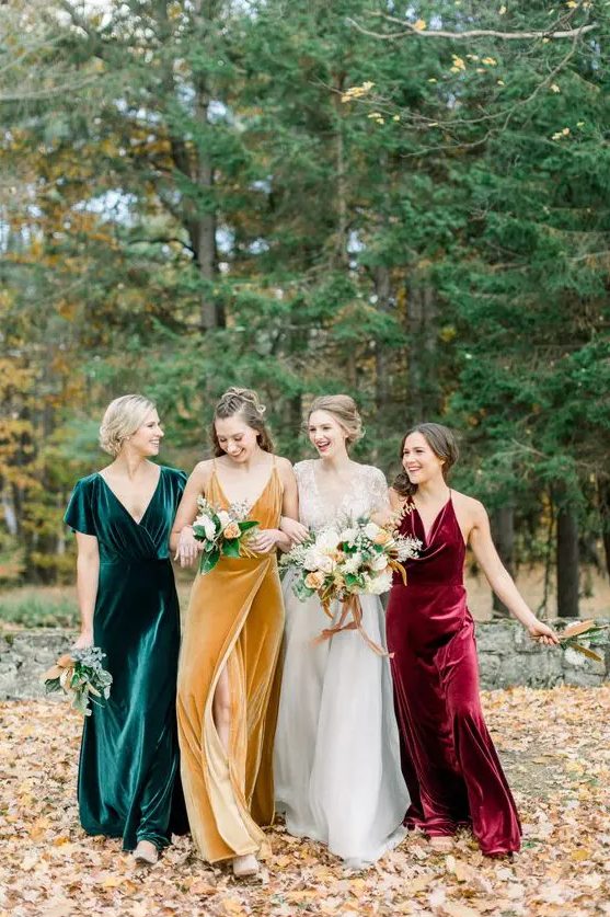 mismatching jewel tone bridesmaid dresses of velvet - an emerald, burgundy and mustard one are fantastic for a fall wedding in bright shades