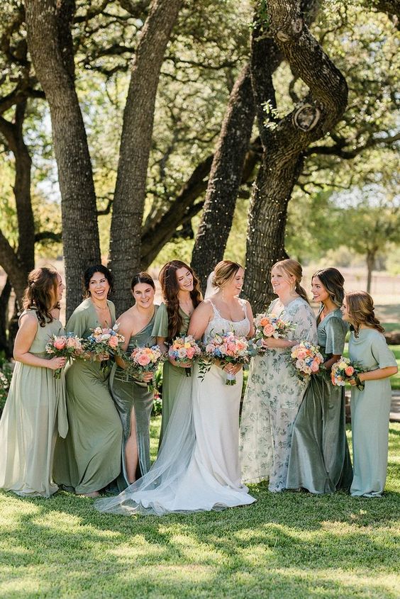 mismatching light green maxi bridesmaid dresses are a chic and catchy idea for a summer wedding