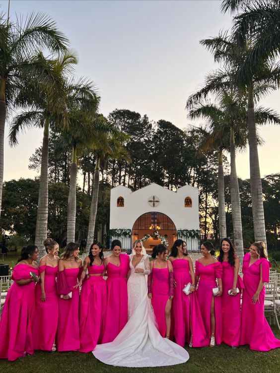 mix and match hot pink maxi bridesmaid dresses are a great solution for a tropical wedding