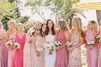 mix and match pink plain and floral midi and maxi bridesmaid dresses are a cool idea for a spring or summer wedding