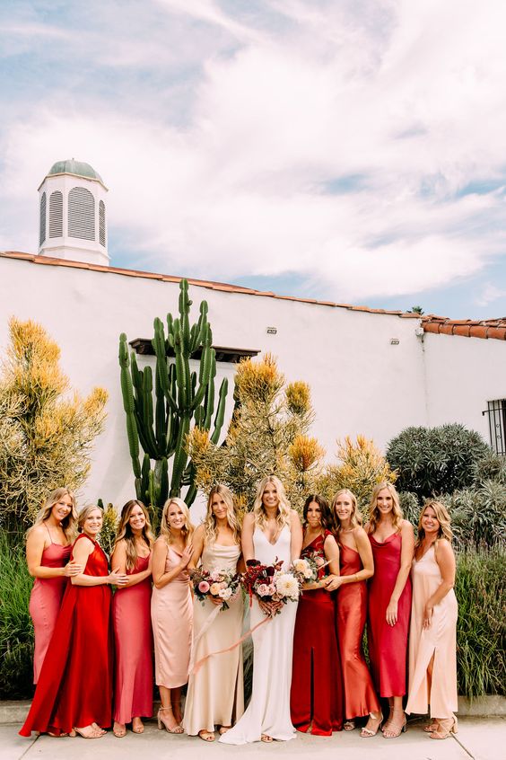 mix and match red, orange and blush midi and maxi bridesmaid dresses for a bold wedding with red shades